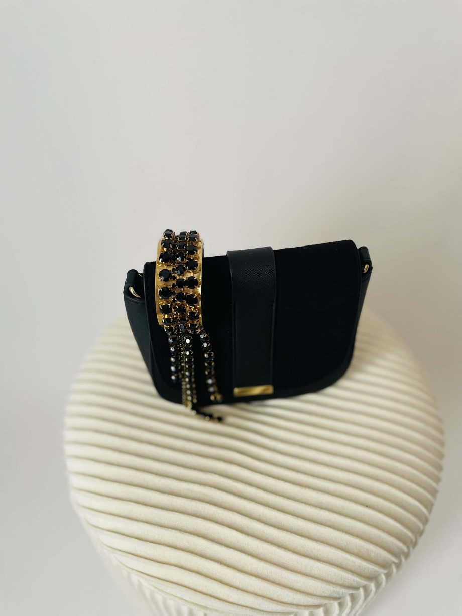 Bracciale rigido dorato con strass neri