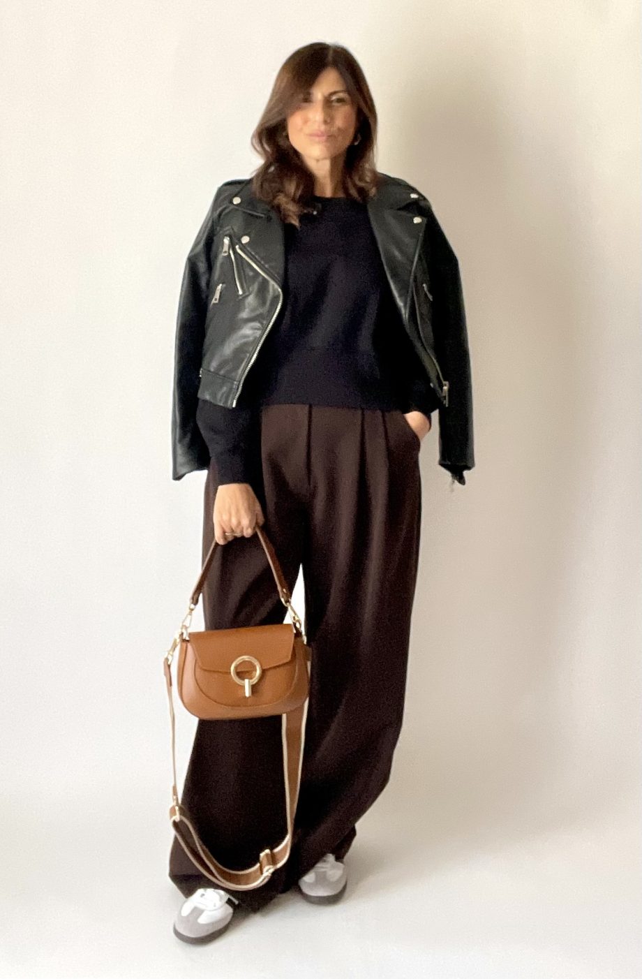Borsa vera pelle con anello dorato