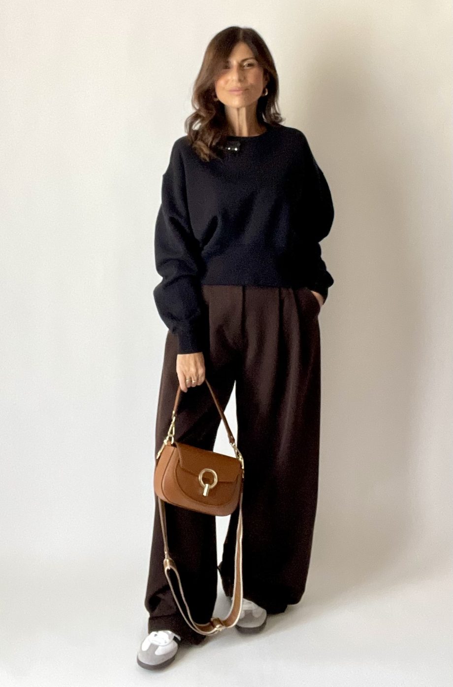 Borsa vera pelle con anello dorato