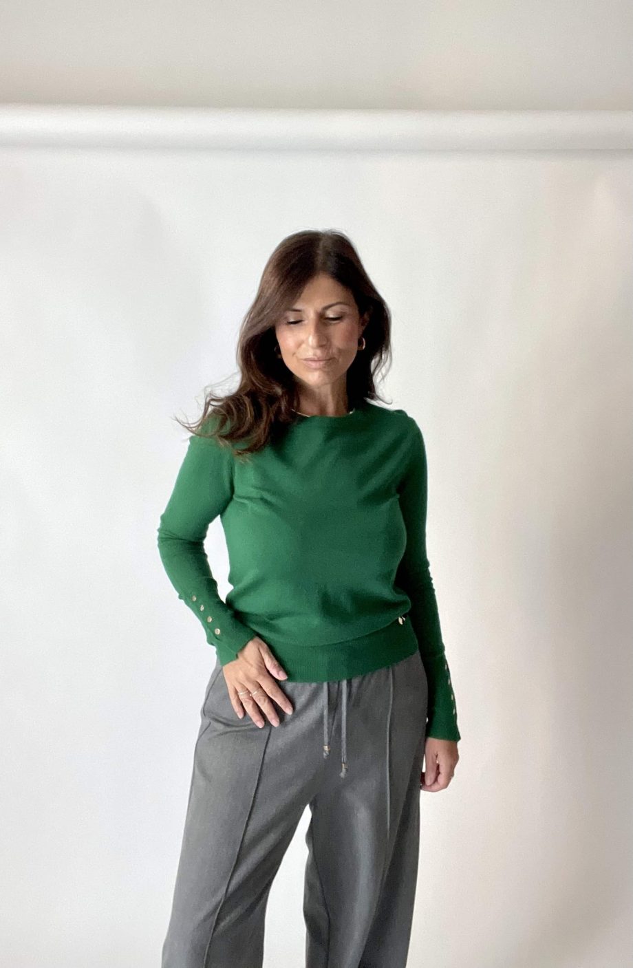 Maglia con bottoni dorati