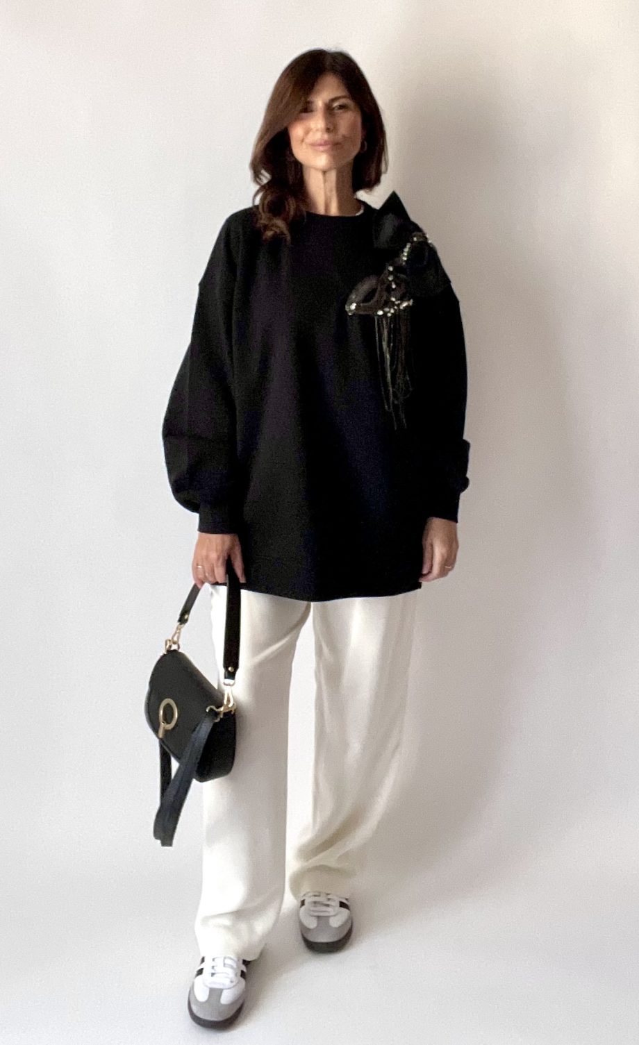 Borsa vera pelle con anello dorato var. nera
